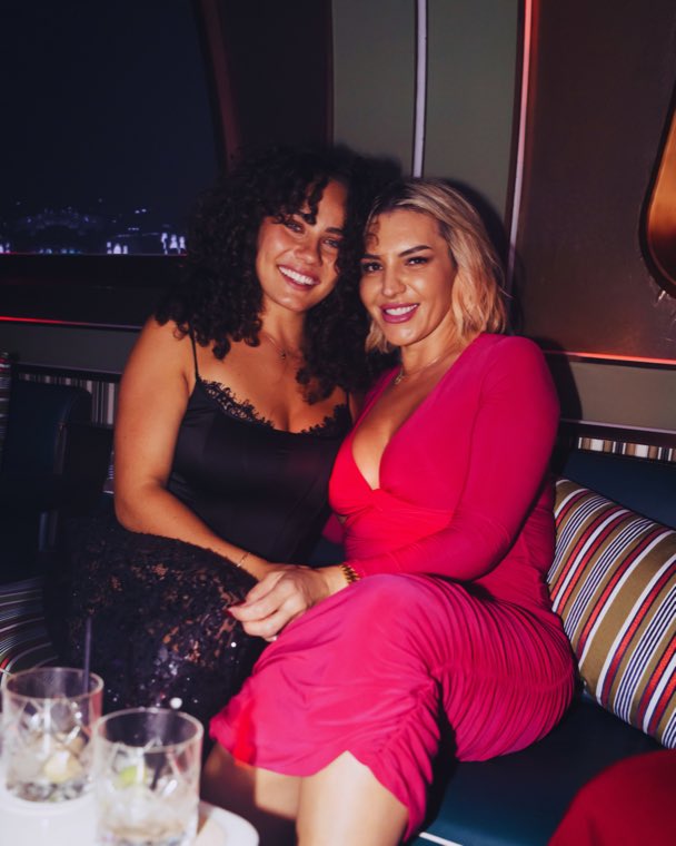 Two guests in a booth